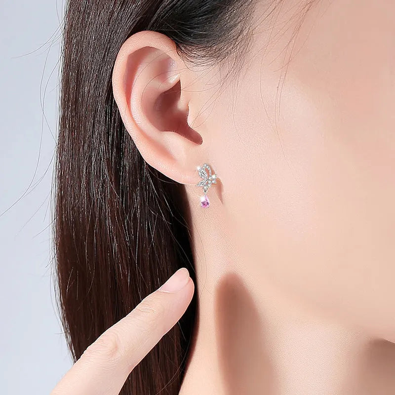 Butterfly design silver stud earrings with crystal accents on 925 silver backing for women