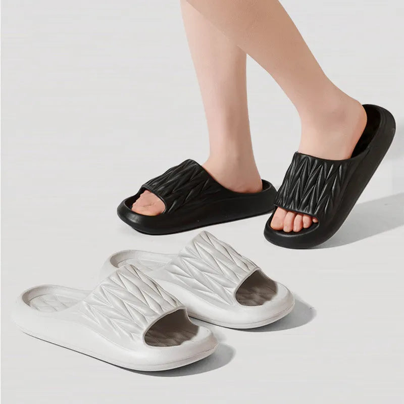Leaf texture pattern EVA slippers showing moulded sole design for indoor non-slip use