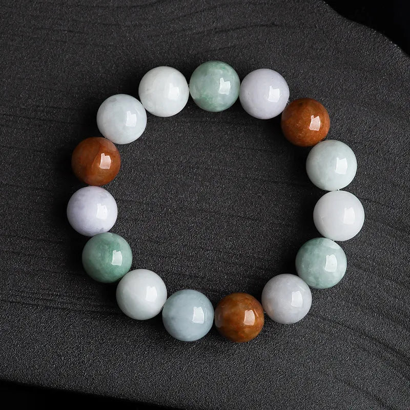 Women's Myanmar jade bracelet with 13mm round beads showing three natural jade colours
