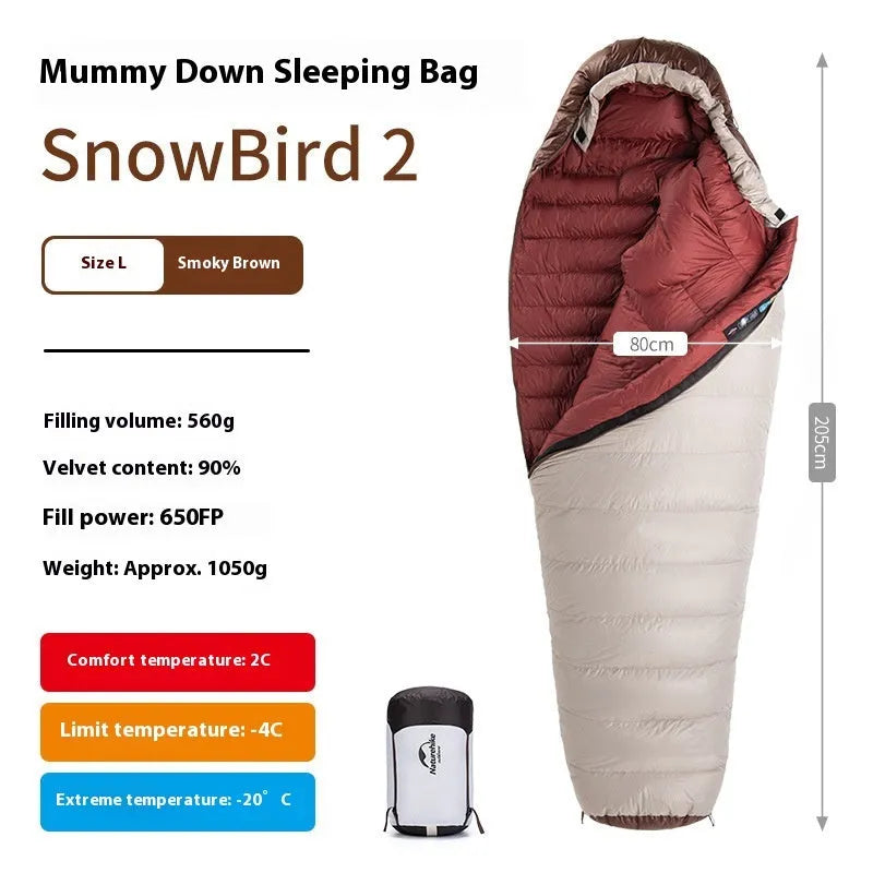 Mummy-style goose down sleeping bag in storage bag, showing colour options and weight specifications for outdoor use