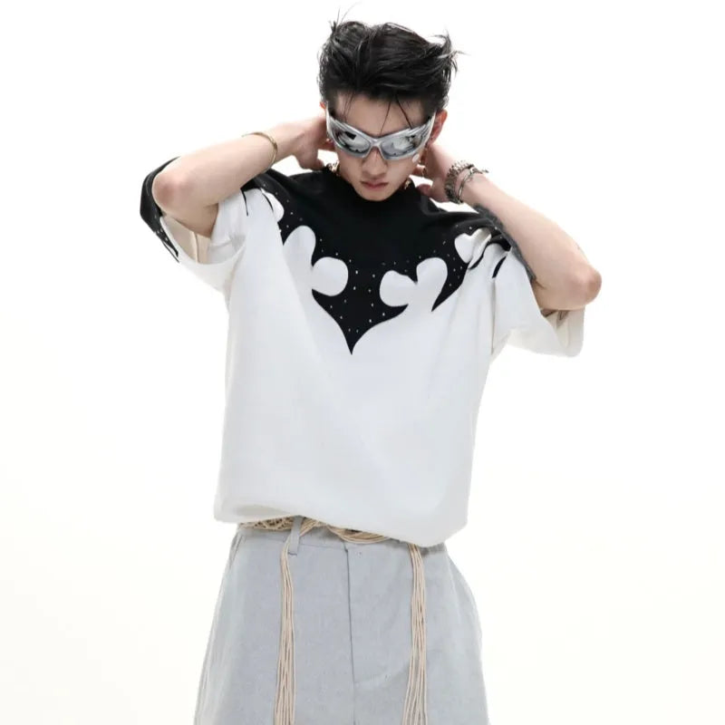Men's cotton short-sleeved shirt with burnt flower detailing and stitching on a grey background