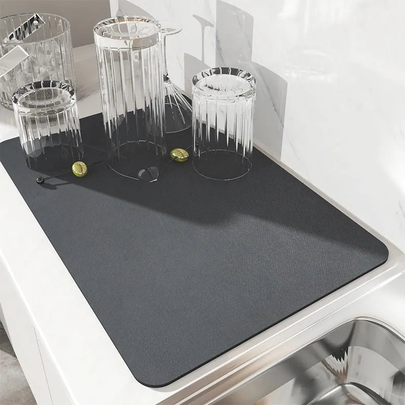 Square technical cloth dish drying mat with PU leather surface and rubber anti-slip backing.