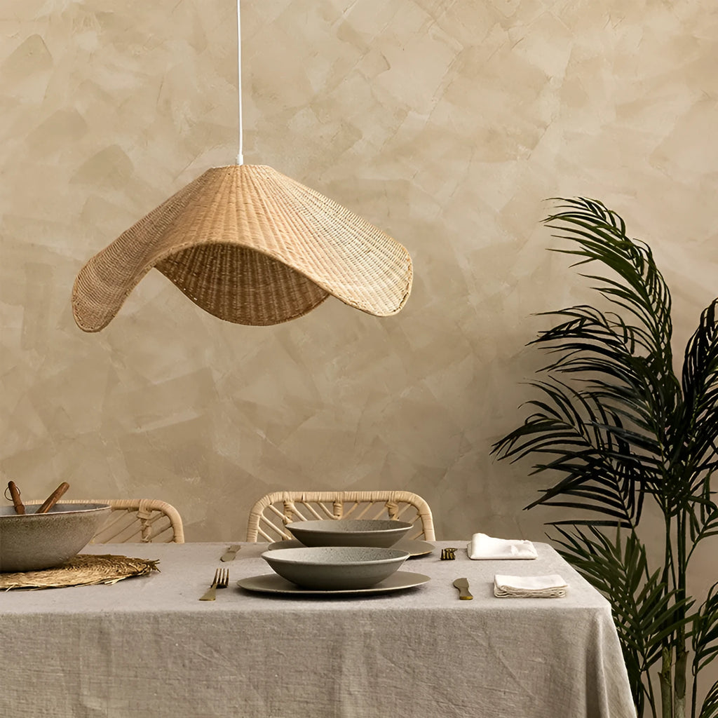 Handmade natural rattan and willow chandelier with warm LED light in three size options.