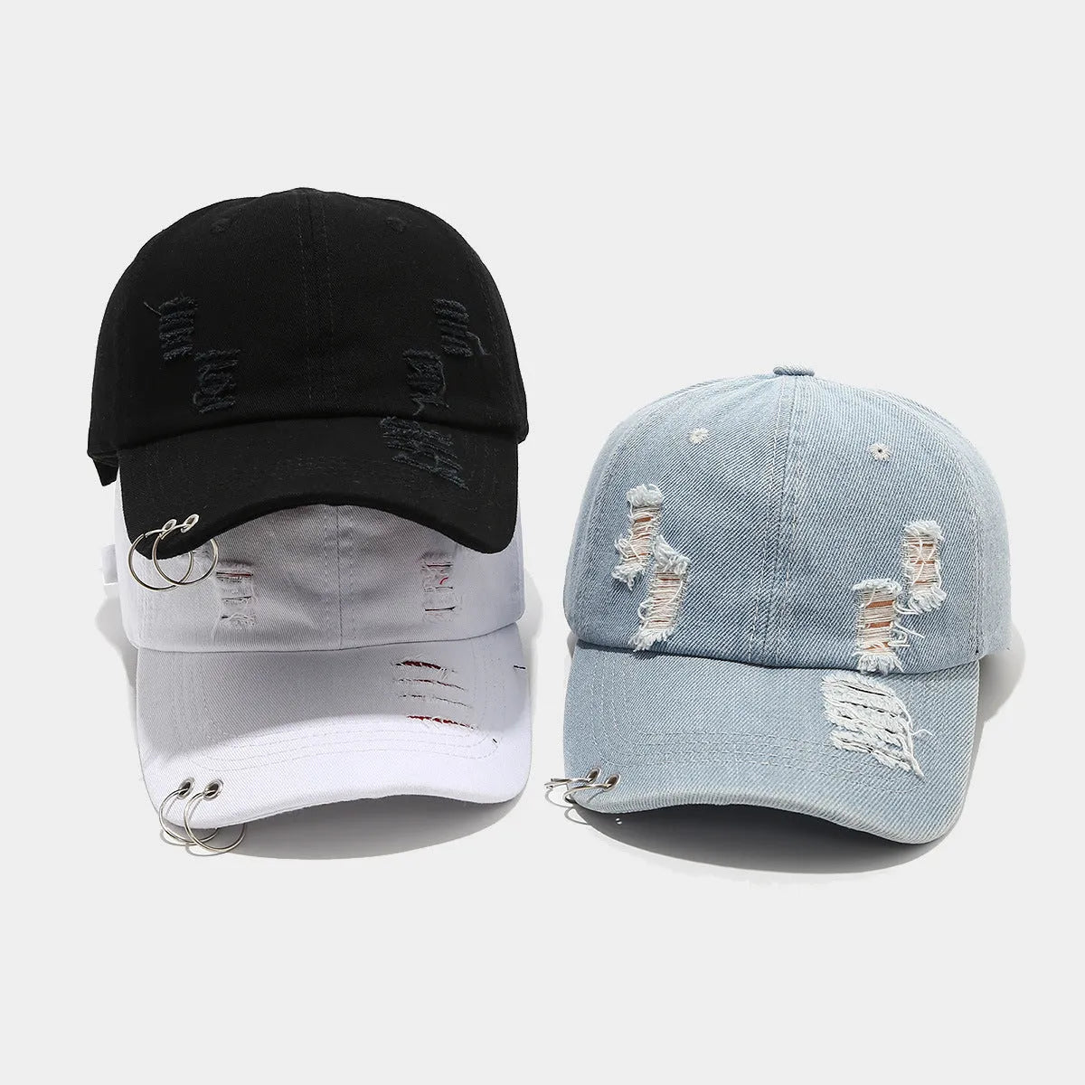 Men's adjustable cotton denim peaked cap in black showing dome crown and peaked brim design