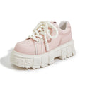 Beige muffin bottom leather shoes with 3cm rubber foam sole on a neutral background