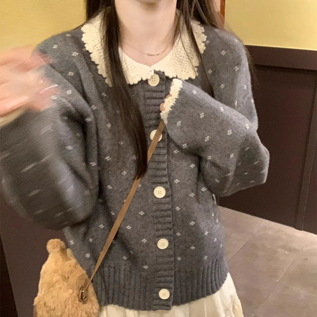 Retro floral Peter Pan collar knitted cardigan coat in grey, shown with button fastening.