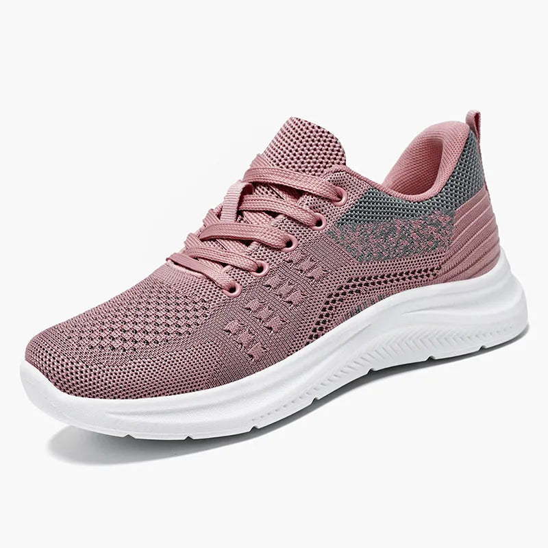 Women's black lightweight mesh sneakers with lace-up front and soft PVC sole on a white background.