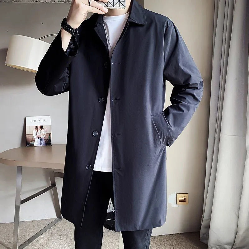 Men's khaki trench coat with loose casual fit and mid-length design
