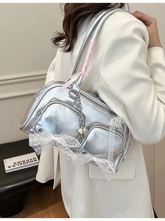Beige PU shoulder bag with double straps and sewing thread detailing, showing horizontal square shape