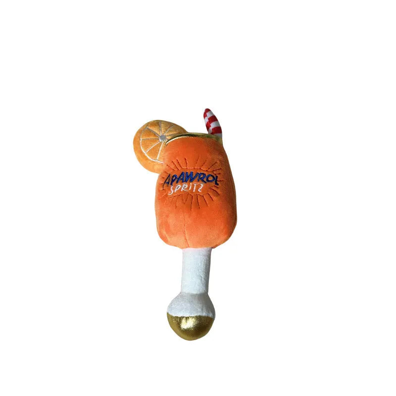 Yellow plush beer bottle dog toy with squeaker on white background