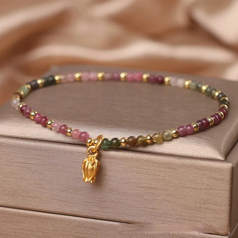Natural tourmaline beaded adjustable anklet and bracelet set with floral charm detail