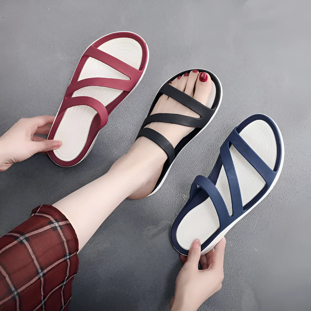 Women's solid colour casual sandals with a breathable PP upper, shown in red.