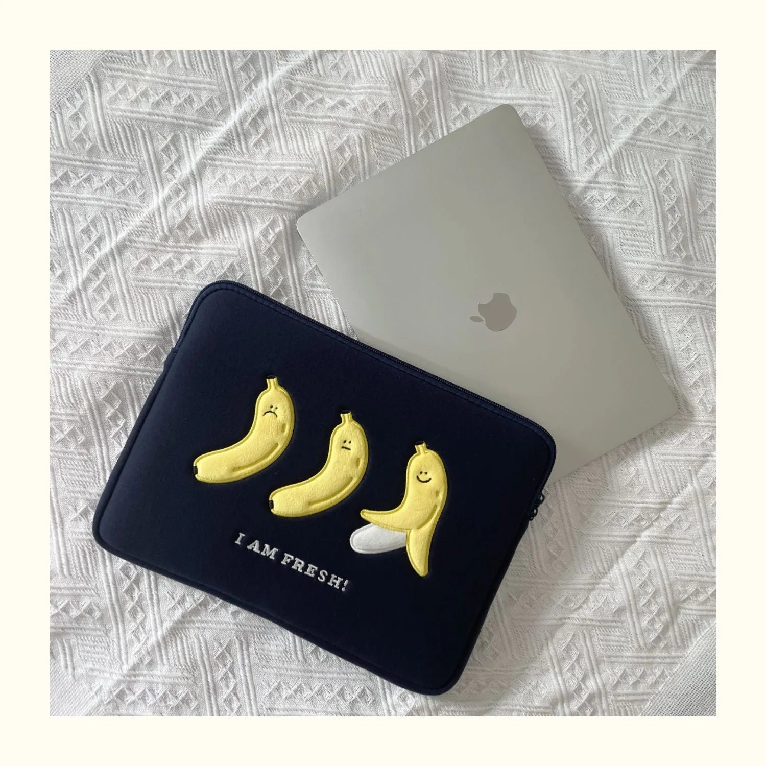 Embroidered animal design laptop sleeve in polyester, showing size options for 13, 14 and 15.6 inch laptops.