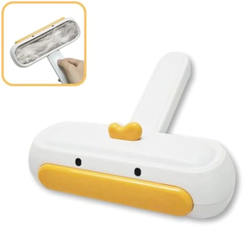 Portable pet hair remover with yellow duck design, reusable for cleaning fur from surfaces