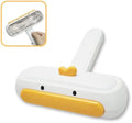 Portable pet hair remover with yellow duck design, reusable for cleaning fur from surfaces