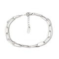 Double layer twin stainless steel bracelet in gold or silver with geometric line design.