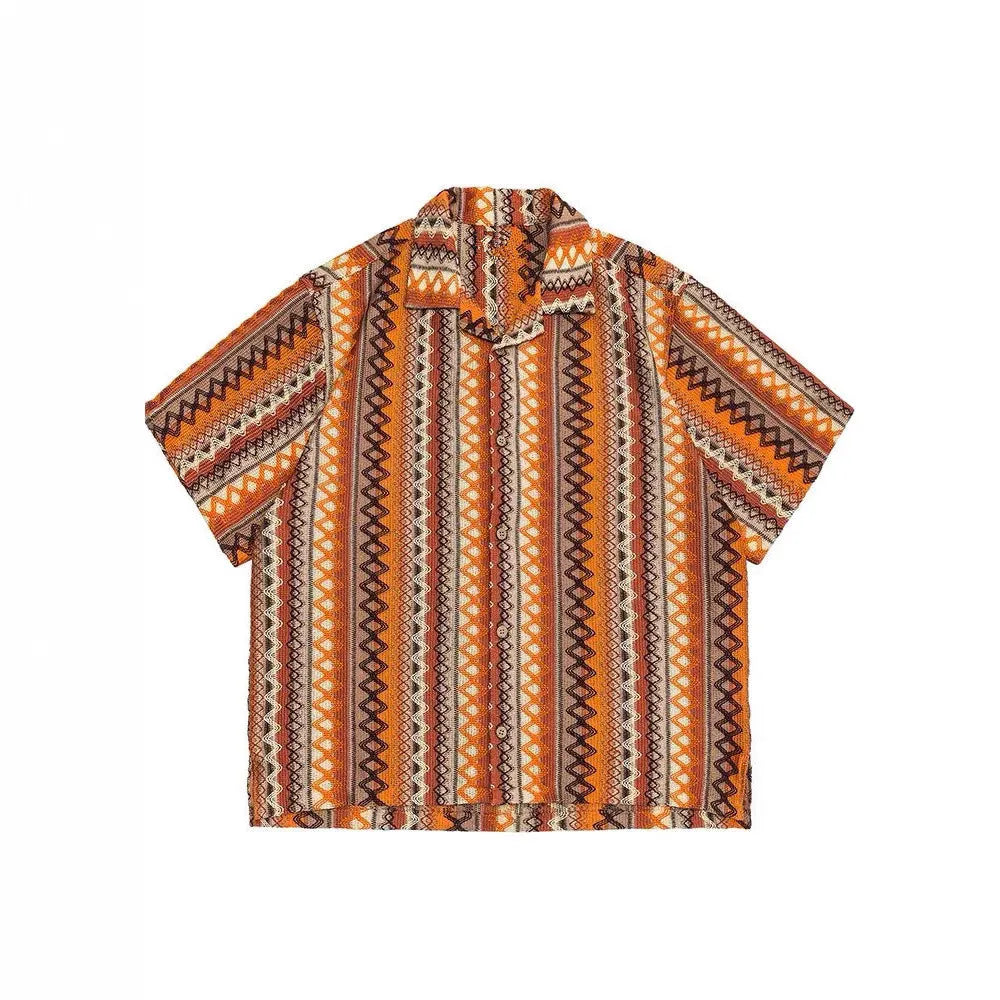 Loose fit ethnic style woven Cuban collar shirt in contrasting colours on a hanger.