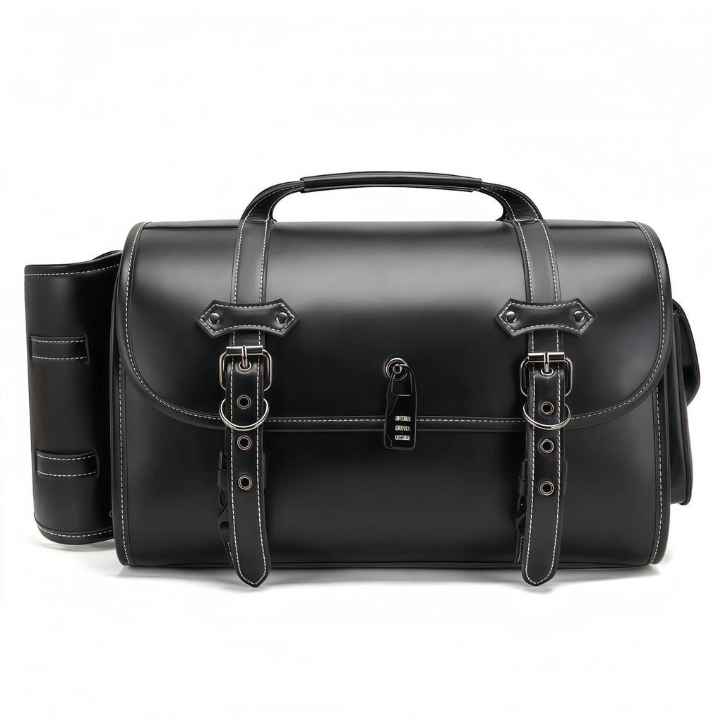 Dark punk motorcycle tail bag with coded lock mounted on cruiser motorcycle