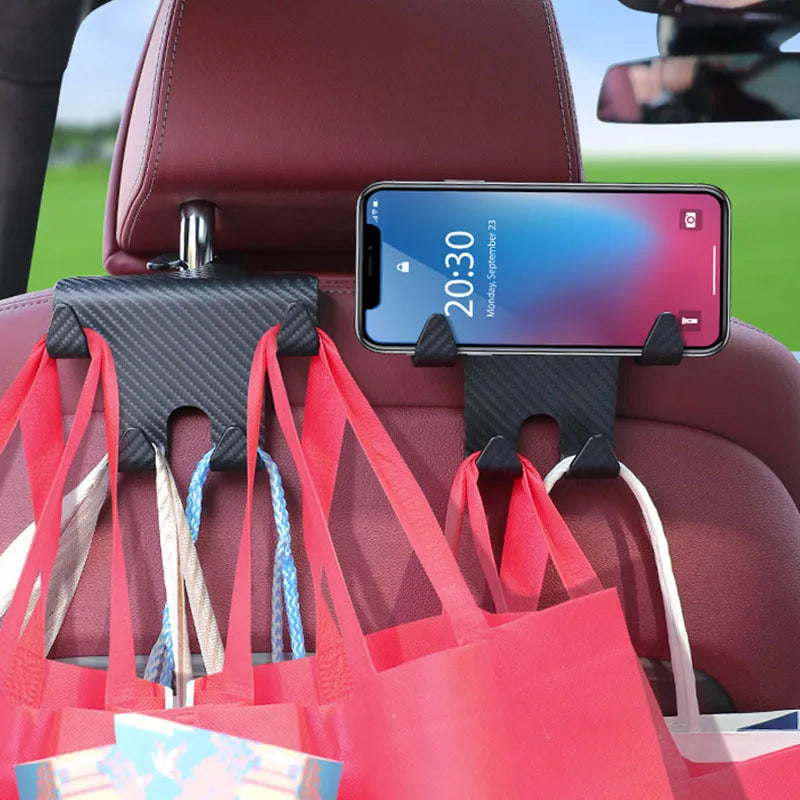 Black ABS plastic car hook and mobile phone holder bracket for rear seat back storage.