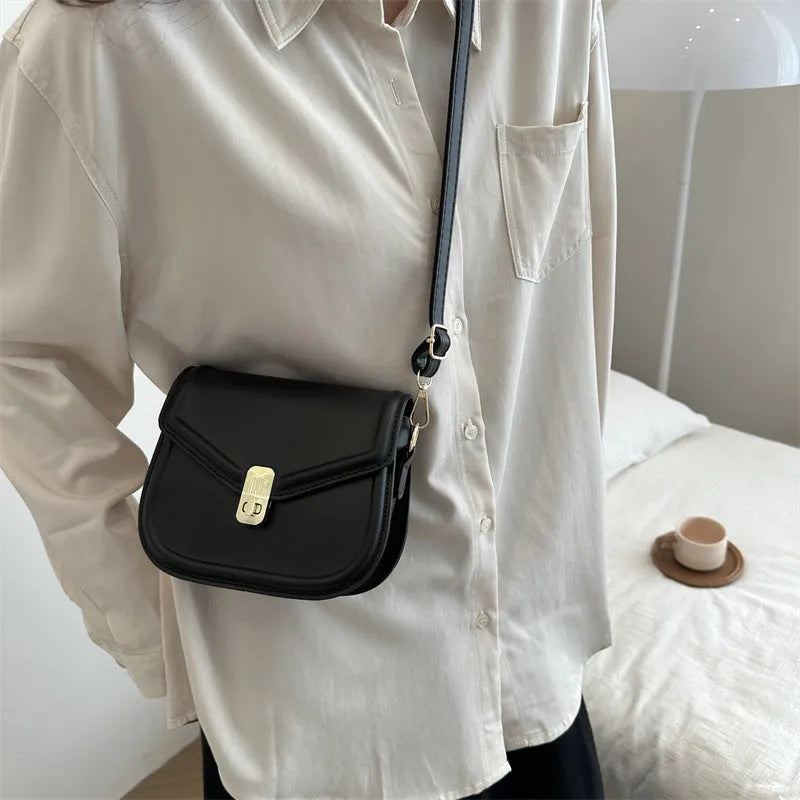 Niche Texture Shoulder Messenger Bag in clamshell design with soft PU material, shown in horizontal square shape.