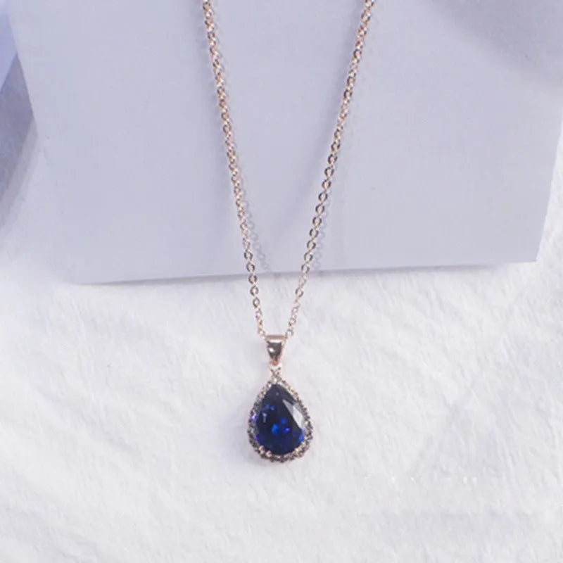 Water drop rose gold rhinestone necklace with adjustable chain and geometric pendant in multiple colours