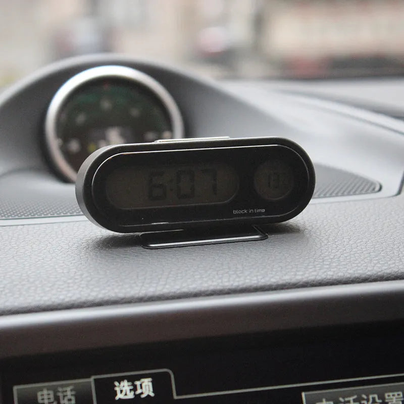 Black car clock thermometer measuring 7.5cm with digital LED display showing time and temperature