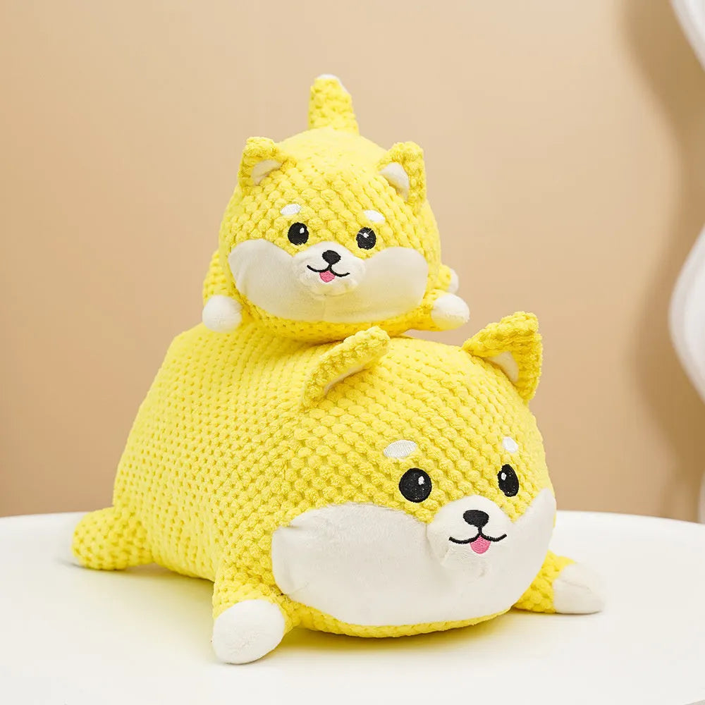 Calming plush dog toy with squeaker vocalisation feature in bite-resistant material