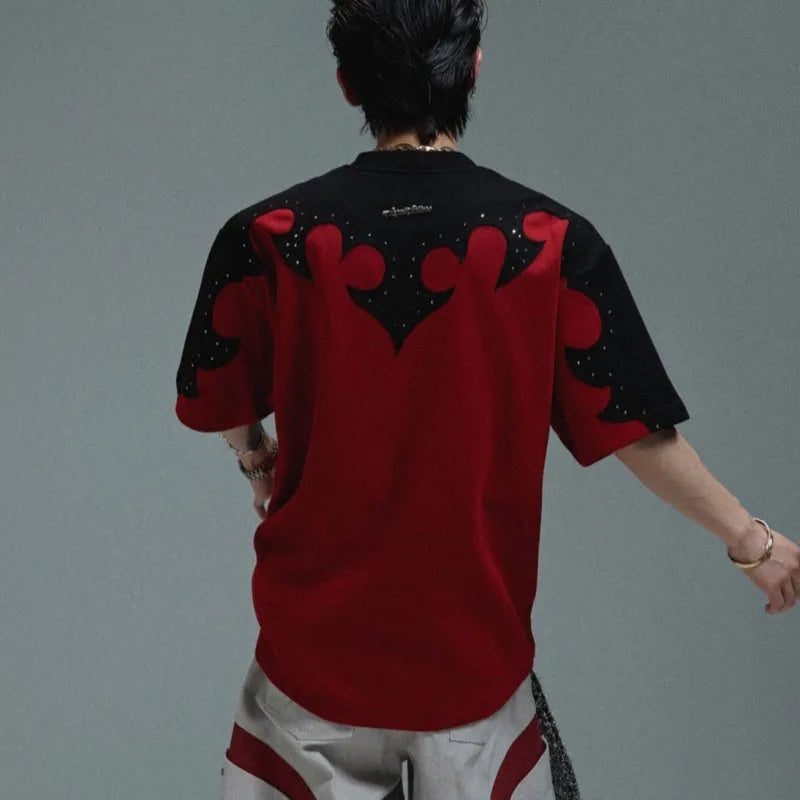 Men's cotton short-sleeved shirt with burnt flower detailing and stitching on a grey background