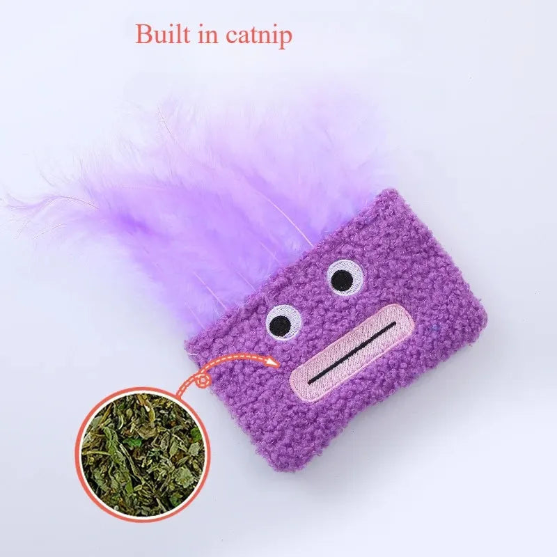 Colourful cat plush toy with a funny big mouth explosion head shape on a plain background.