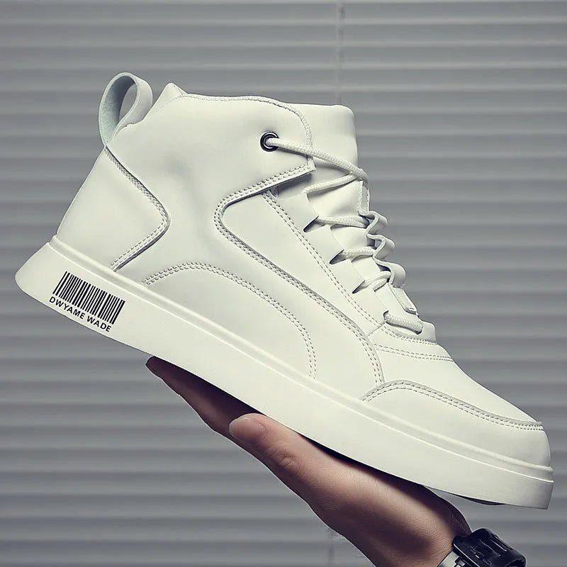 Men's white mid-top sports board shoes with low heel, round toe, and rubber sole on a casual background