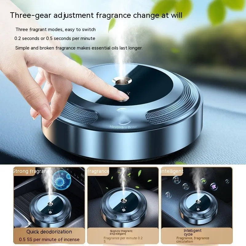 Compact automatic car air freshener machine with zinc alloy shell on a car dashboard.