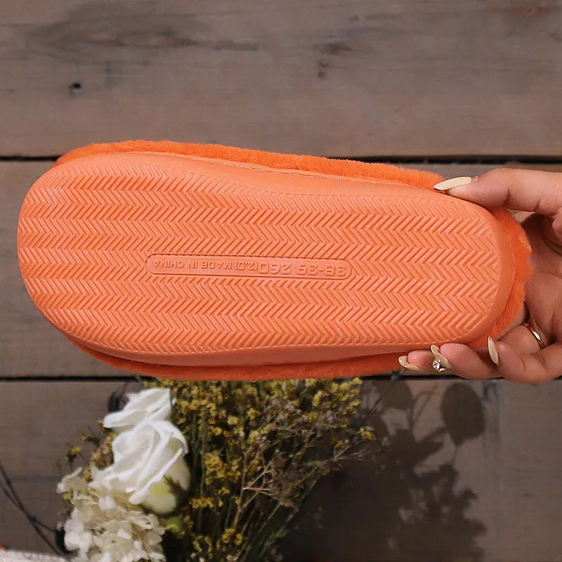 Orange pumpkin slippers with plush lining and non-slip PVC soles in UK sizes 36-43
