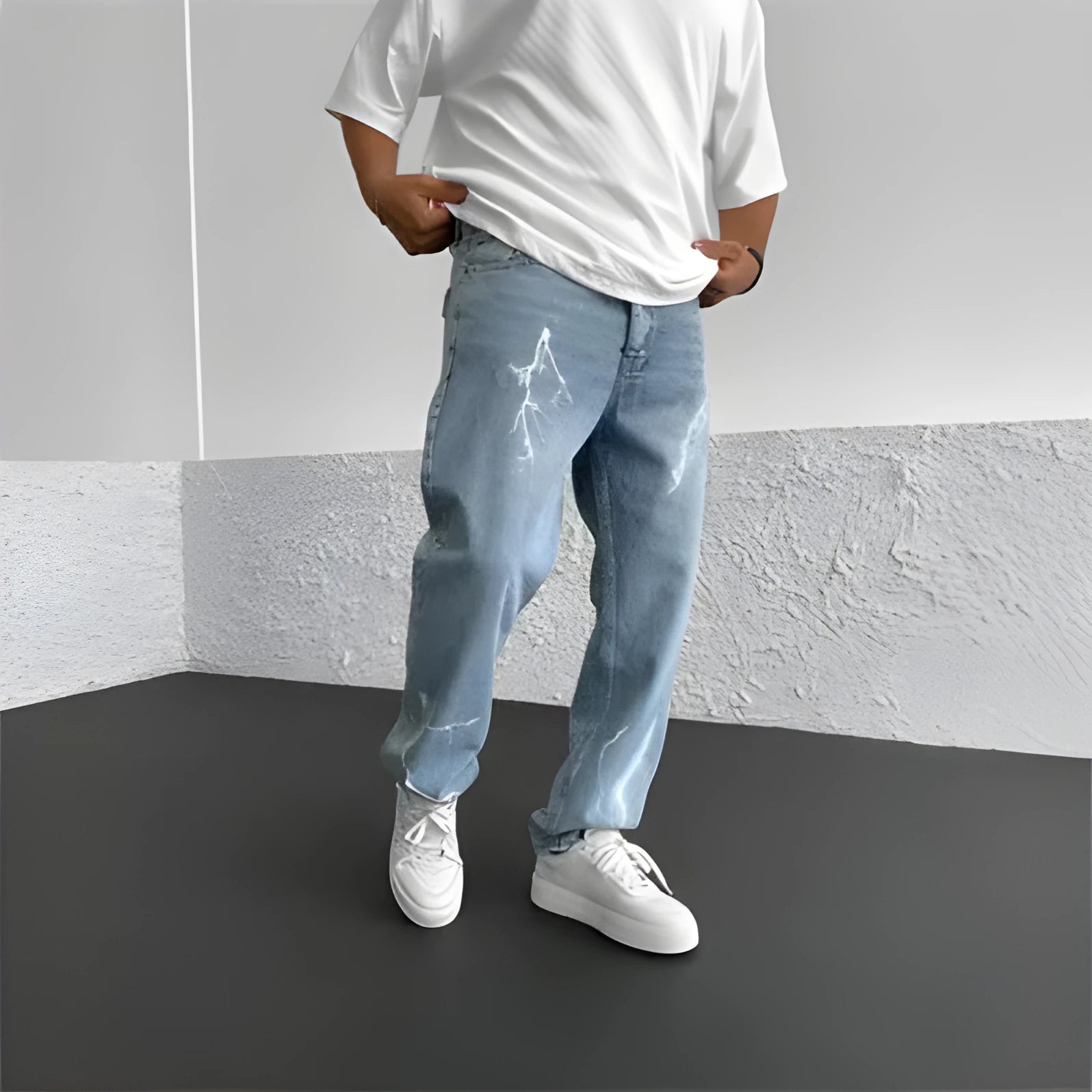 Men's blue straight-leg jeans with a loose wide-leg cut and printed design.