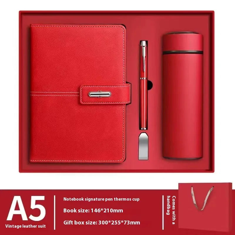 A5 notebook with imitation leather cover in various colours, open to show wood-free paper pages