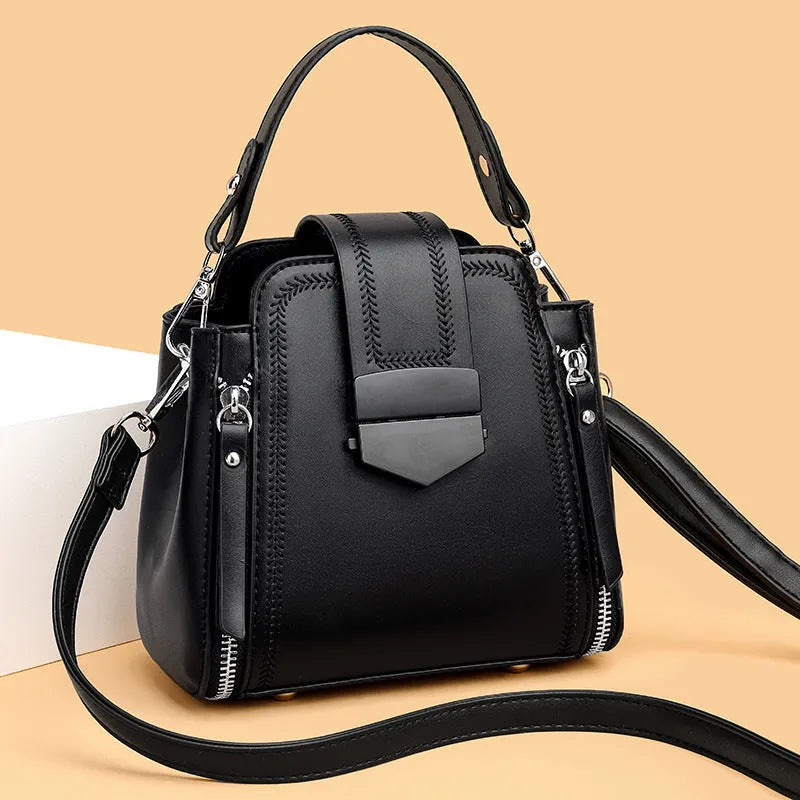 Small square handbag in soft textured PU leather with sewing thread details