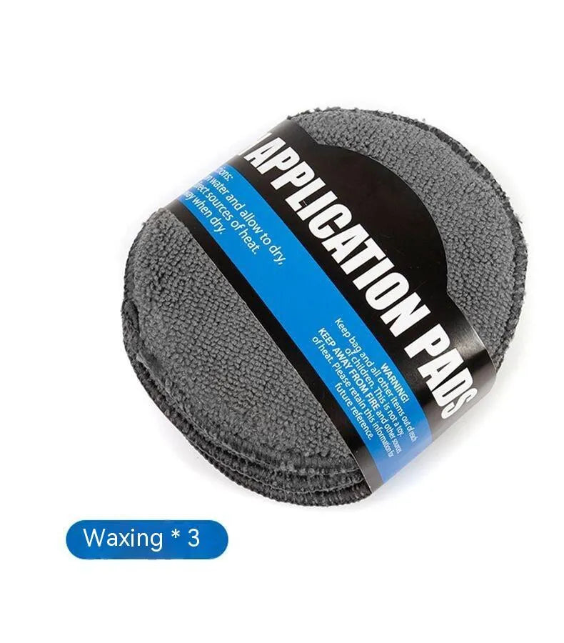 Nine-piece grey microfiber car wash set with gloves, sponge, brush, towels, and waxing wipes