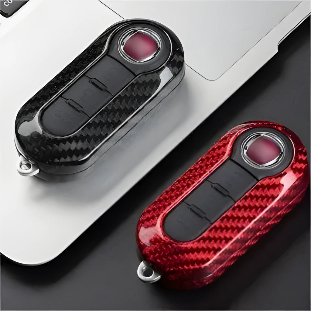 Carbon fibre and glass fibre replacement shell for a car key fob in black, red, and silver black colours.