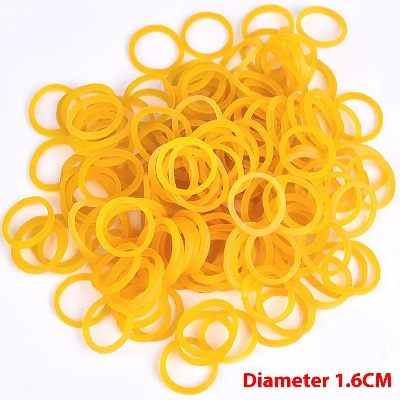 Yellow rubber bands in seven diameters from 16mm to 70mm, 500g pack for bundling and organising