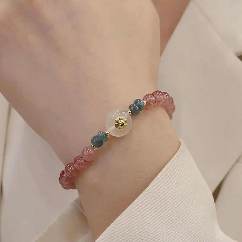 Women's strawberry quartz bracelet with blue water emerald pendant and peace buckle clasp