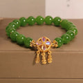 Women's green jasper crystal bracelet with four-leaf clover dream catcher pendant original design