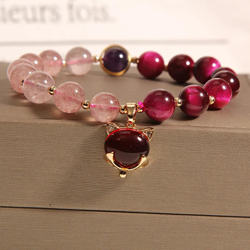 Strawberry crystal bracelet on elastic rope measuring 18cm length