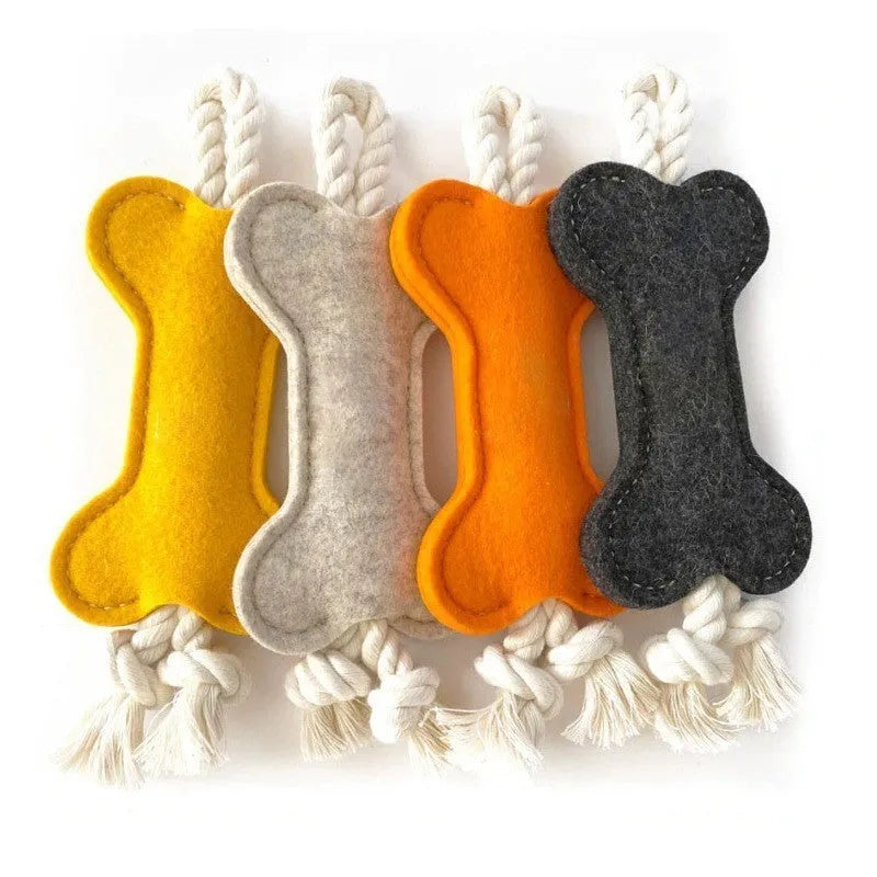 Bone-shaped dog toy with rope knots in felt construction, measuring 16cm by 7cm