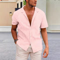 A corduroy short sleeve button shirt in a solid colour, shown in a British style cardigan fit.