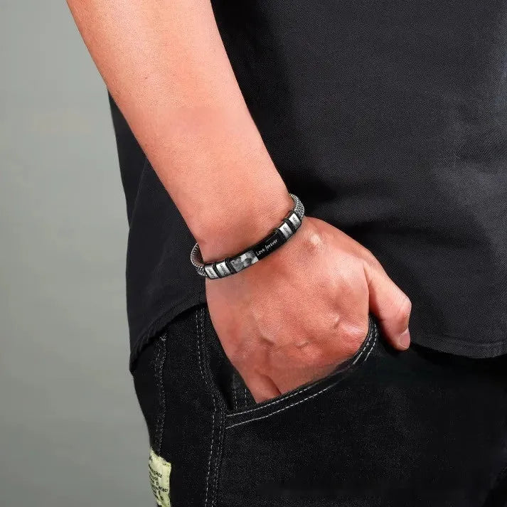 Adjustable leather rope bracelet with titanium steel lettering beads and a heart-shaped charm.