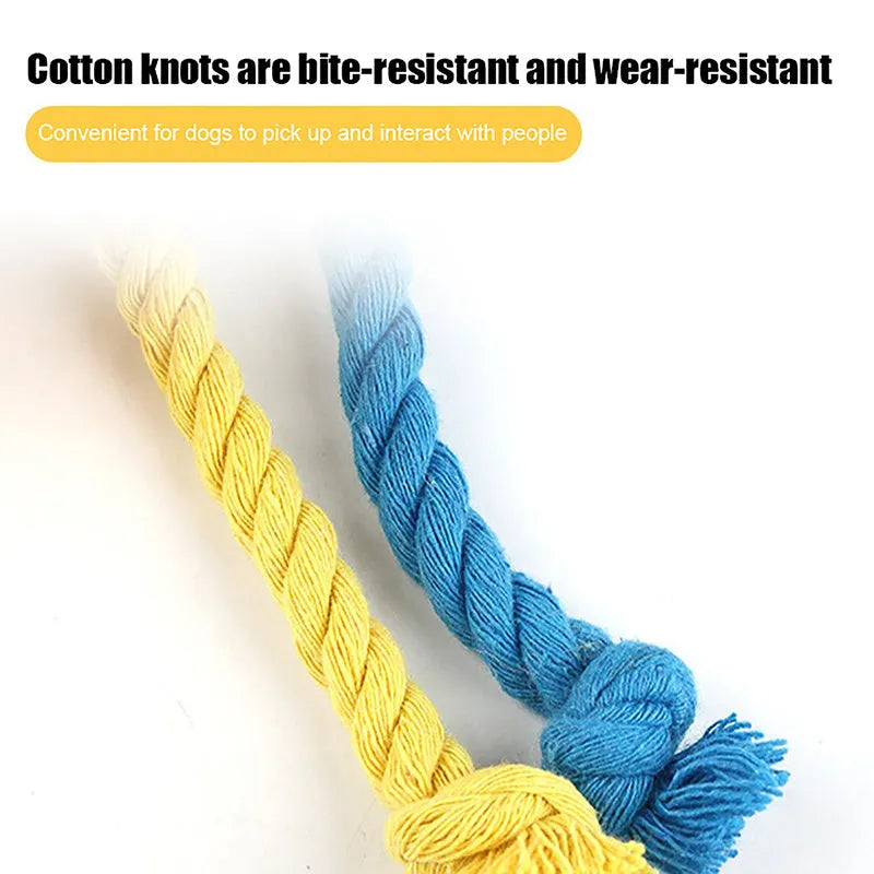 Blue and yellow elastic football dog toy made from cotton rope for tug of war and teeth grinding.