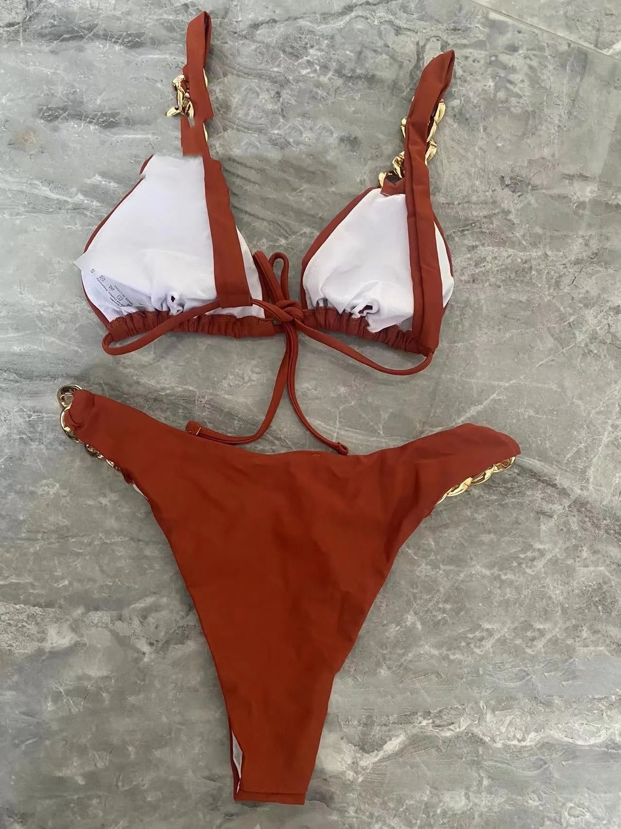Brown women's tube-top push-up bikini swimsuit with adjustable ring tether and split style design