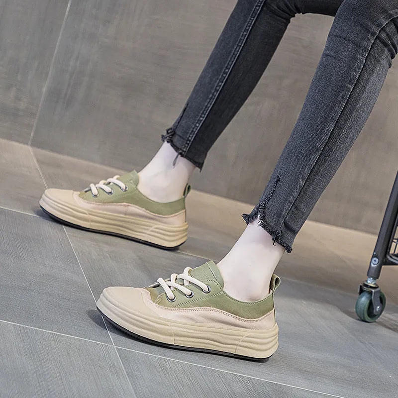Women's matcha green leather platform sneakers with round toe and lace-up front on a white background.