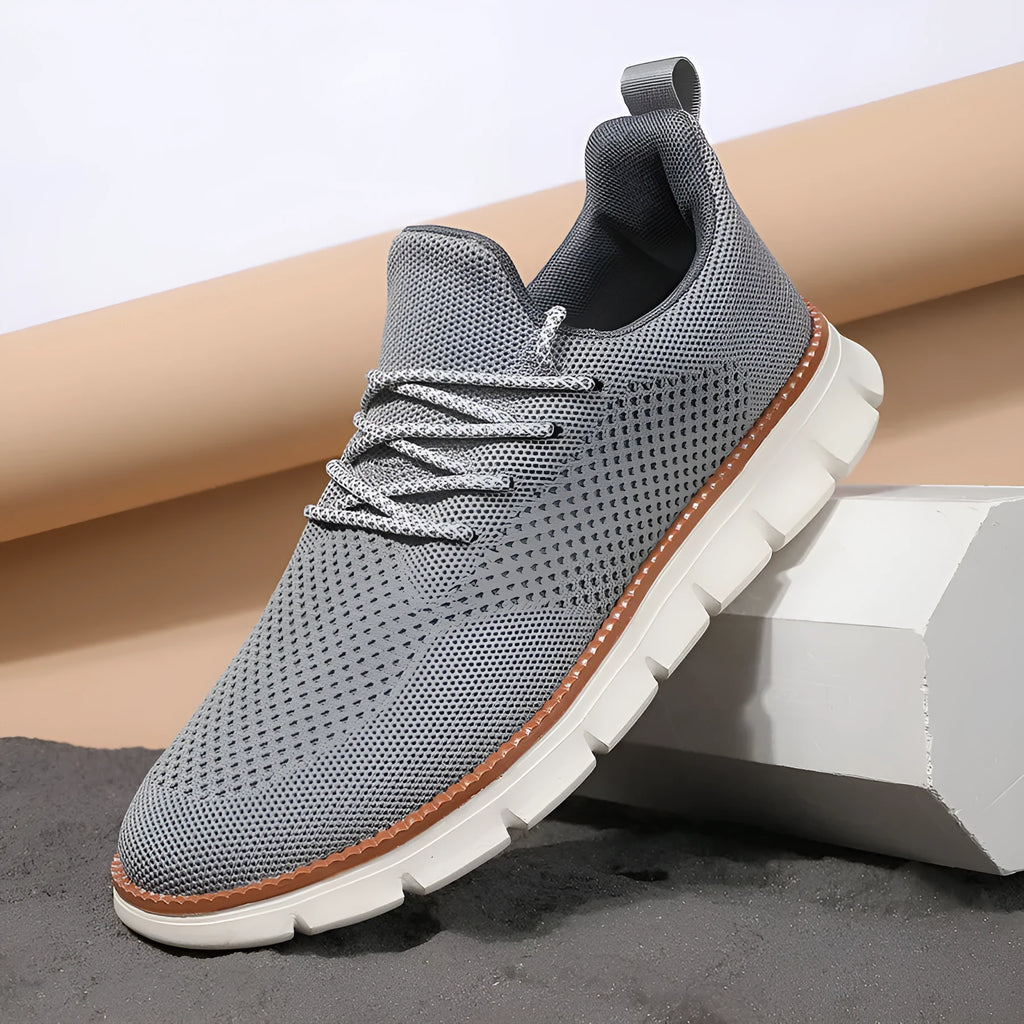 Men's grey and black fly woven mesh sneakers with round toe and low-heel design