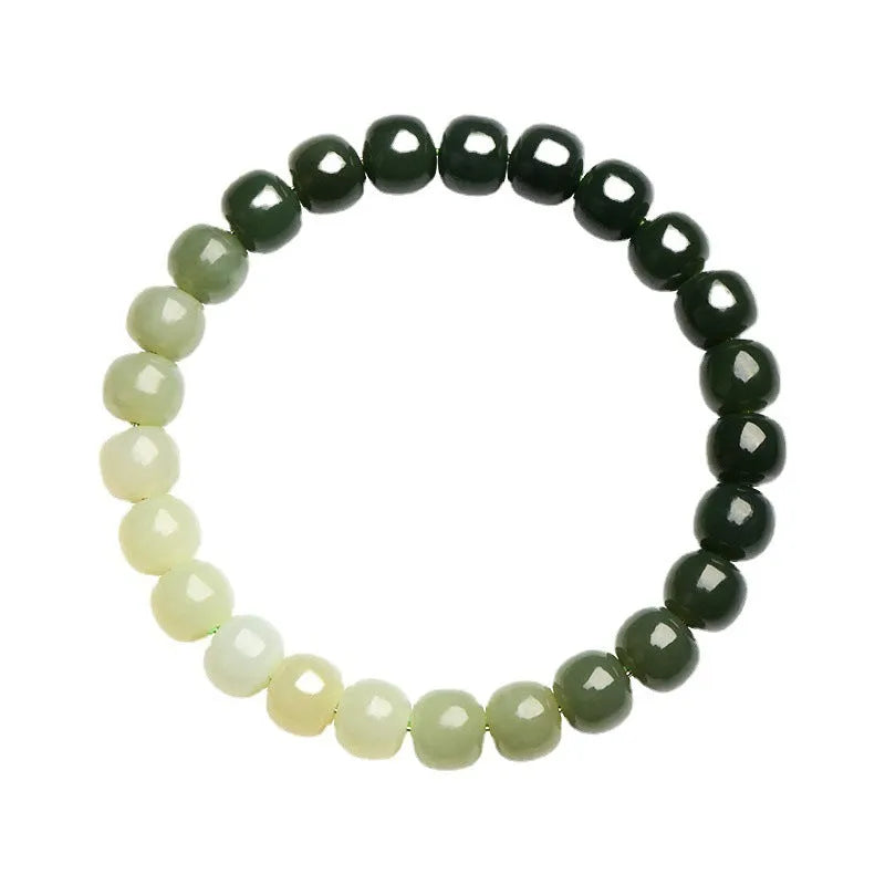 Natural Hetian jade bracelet with gradient clear water colours showing polished beads