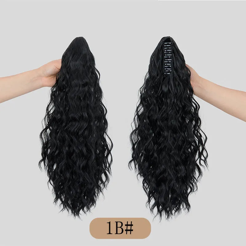 Corn curler wig with water ripple grip ponytail in synthetic high-temperature fibre, shown with hair clip.